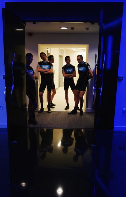 Waiting in the shadows: Wiggins and his new teammates at the first Team Sky presentation
