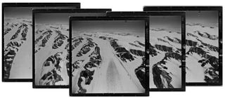 A set of five images of glaciers are overlapped to show a larger panorama.