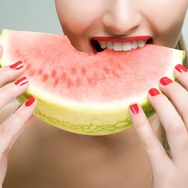 Woman Eating Watermelon