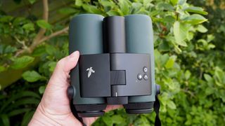 Swarovski AX Visio 10x32 binoculars held in hand