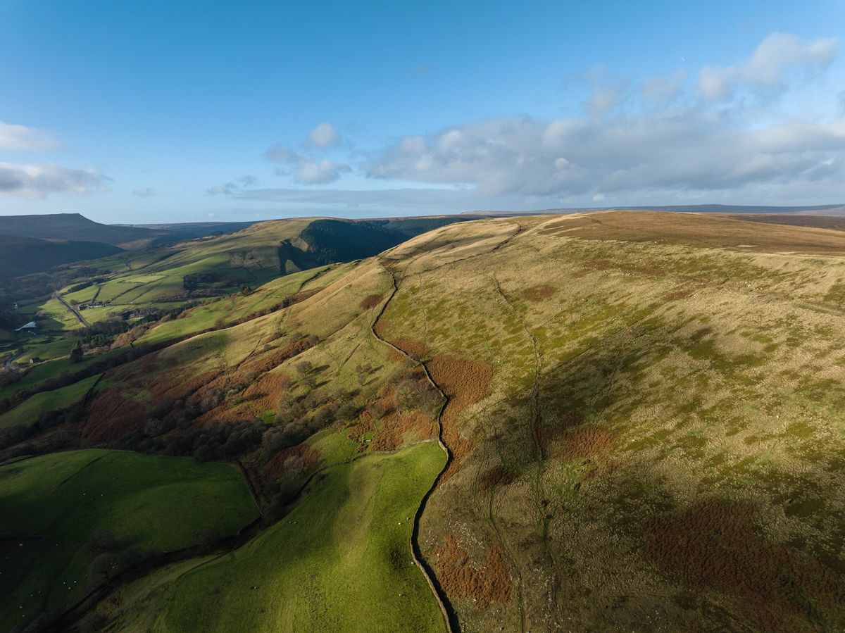 Image taken by James Abbott using the DJI Mavic 3 Classic. Here we see an overhead shot of a grassy hillside.