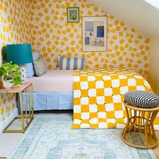 patterned bedroom with yellow adhesive vinyl wallpaper