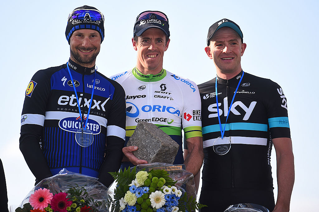 Tom Boonen, Mathew Hayman, and Ian Stannard stand on the podium following the 2016 Paris-Roubaix