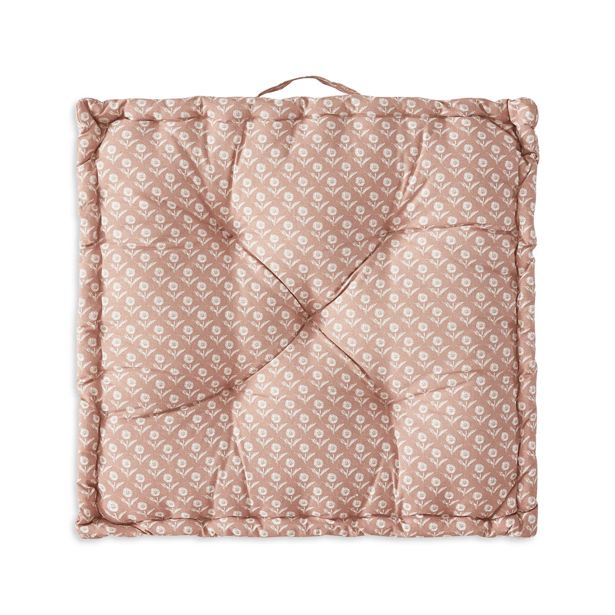 a pink floral floor pillow
