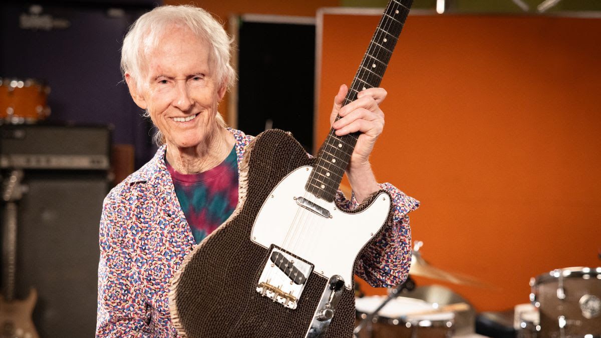 Robby Krieger holding a cardboard Tele