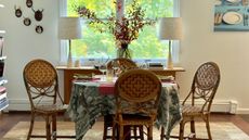 Table set for four people with rustic fall decor