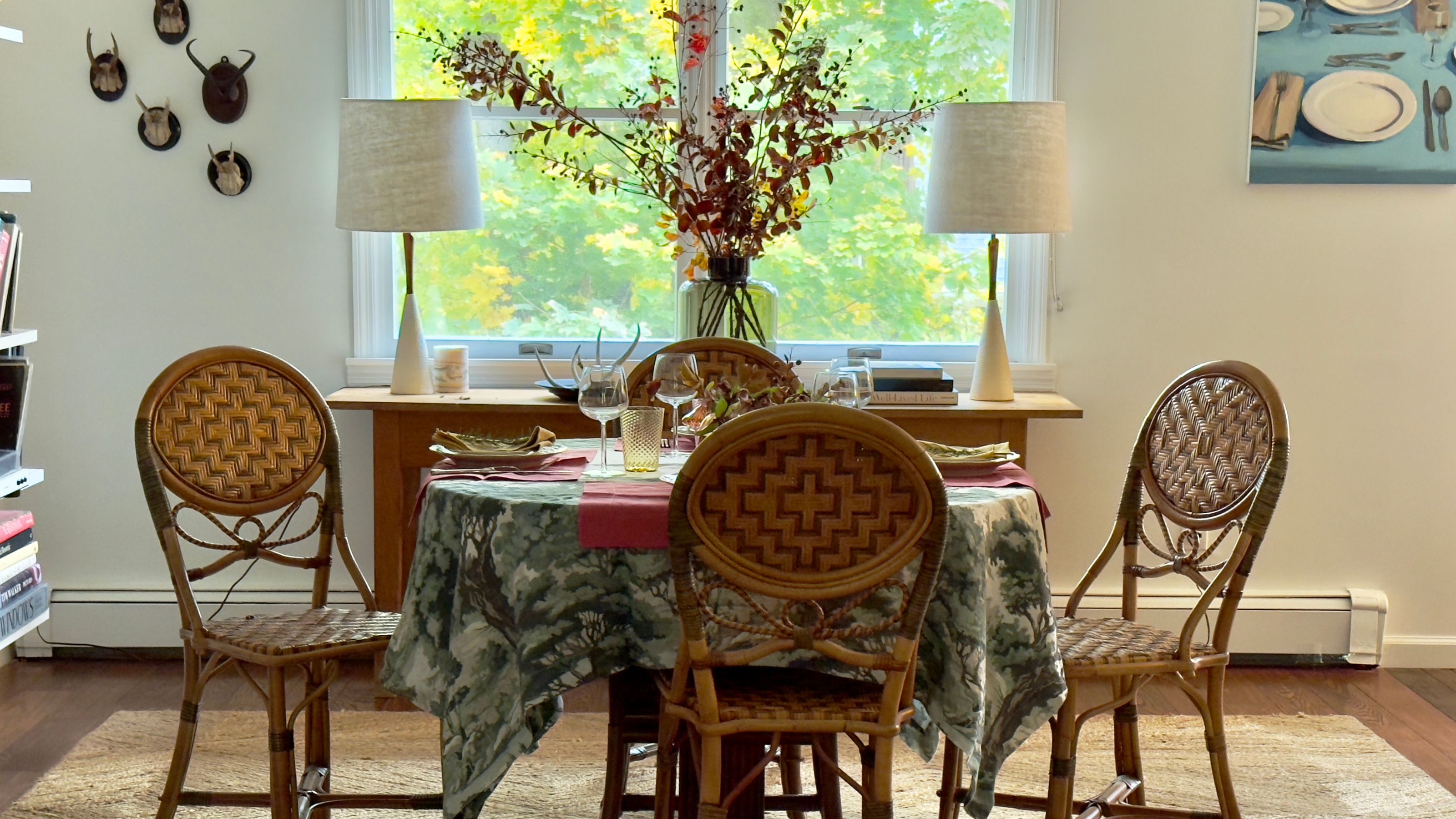 Table set for four people with rustic fall decor