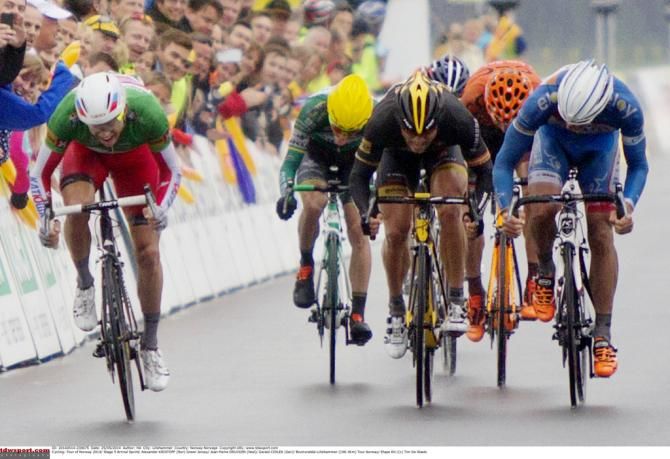 Alexander Kristoff (Katusha) wins the sprint from a small select group