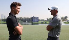 Lando Norris and Rory MciIlroy talk at the Dubai Desert Classic