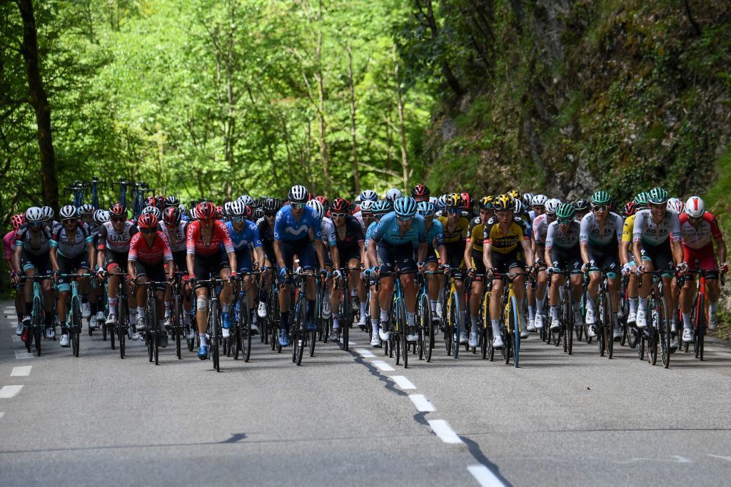 The pack rides during the sixth stage of the 73rd edition of the Criterium du Dauphine cycling race a 167km between LoriolsurDrome and Le SappeyenChartreuse on June 4 2021 Photo by Alain JOCARD AFP Photo by ALAIN JOCARDAFP via Getty Images