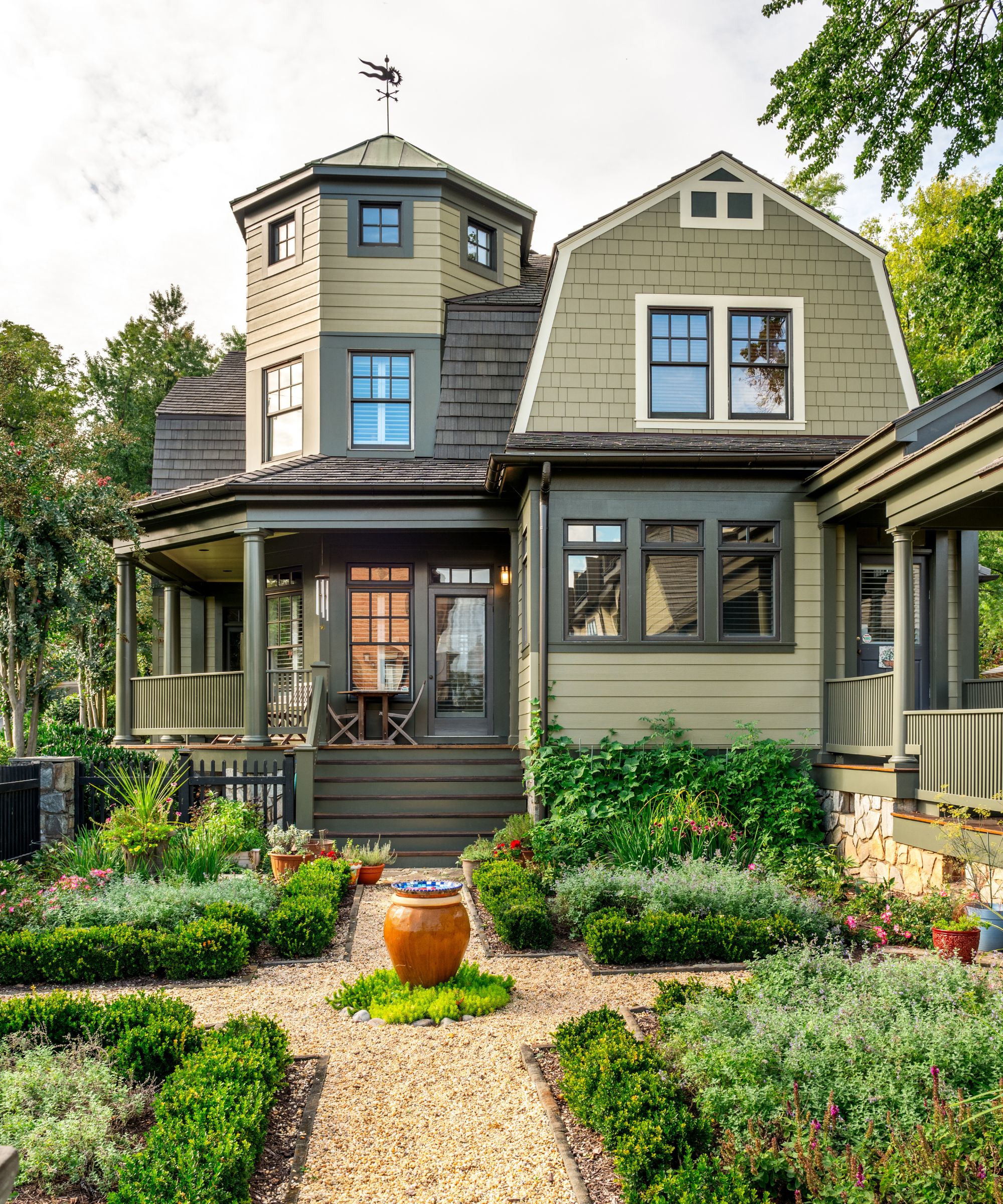 Timber property painted in Benjamin Moore's Hancock Gray, Abingdon Putty and Tuscany Green