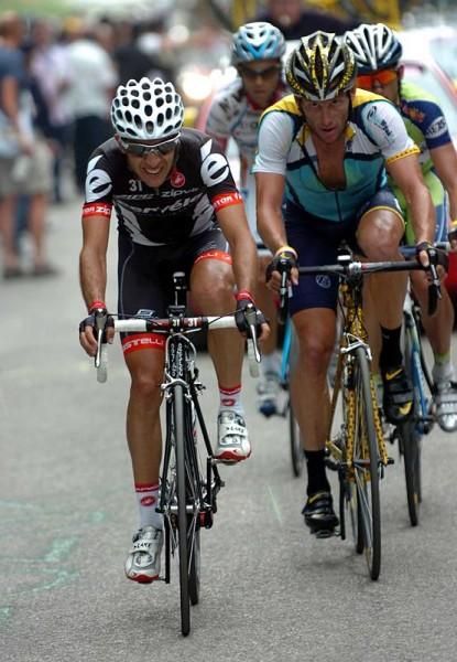 Carlos Sastre rides ahead of Lance Armstrong at the 2009 Giro d'Italia