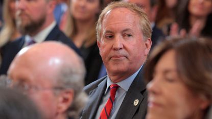 Texas Attorney General Ken Paxton attends the executive order signing ceremony to reduce the size and scope of the Education Department at the White House on March 20, 2025.