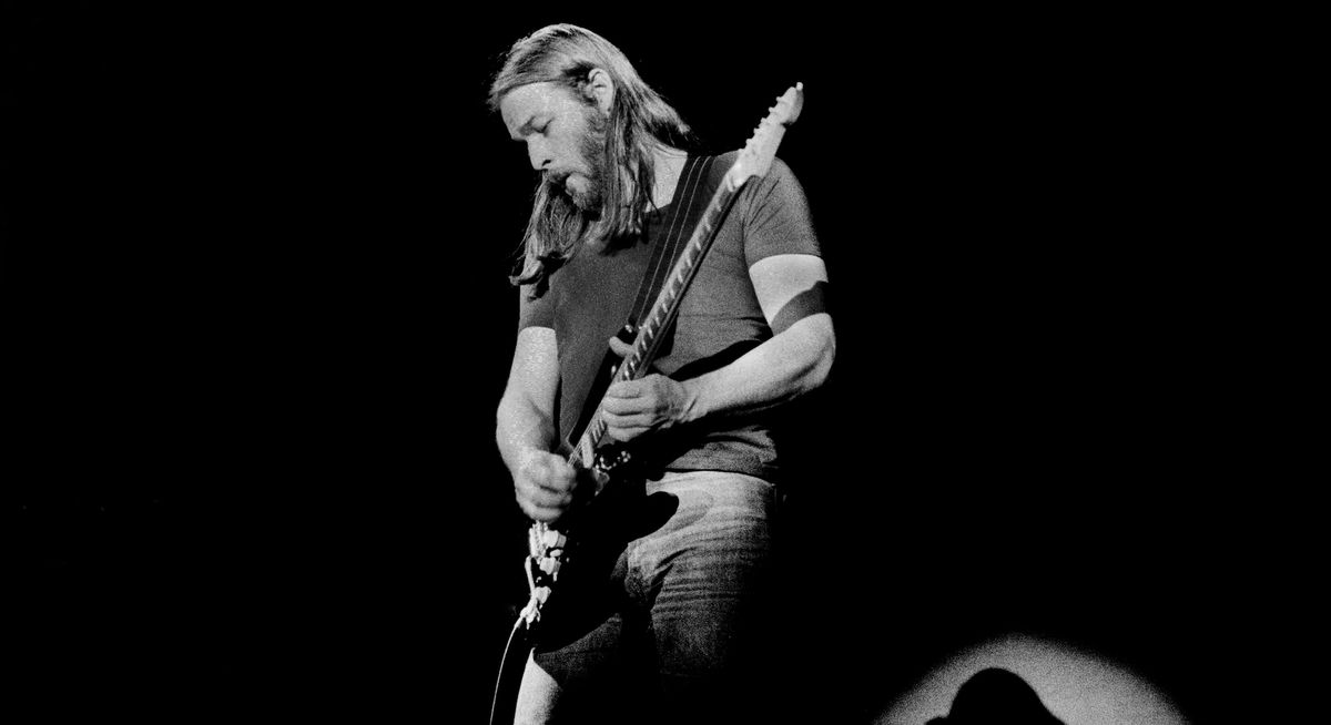 David Gilmour performs live with Pink Floyd onstage at Ahoy in Rotterdam, Holland in February 1977