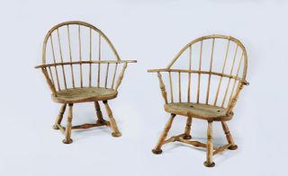 A pair of windows elbow chairs.