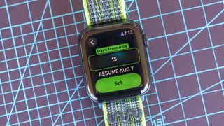 Close-up of the Apple Watch SE 2022 and Apple's Activity app where you can now pause Rings