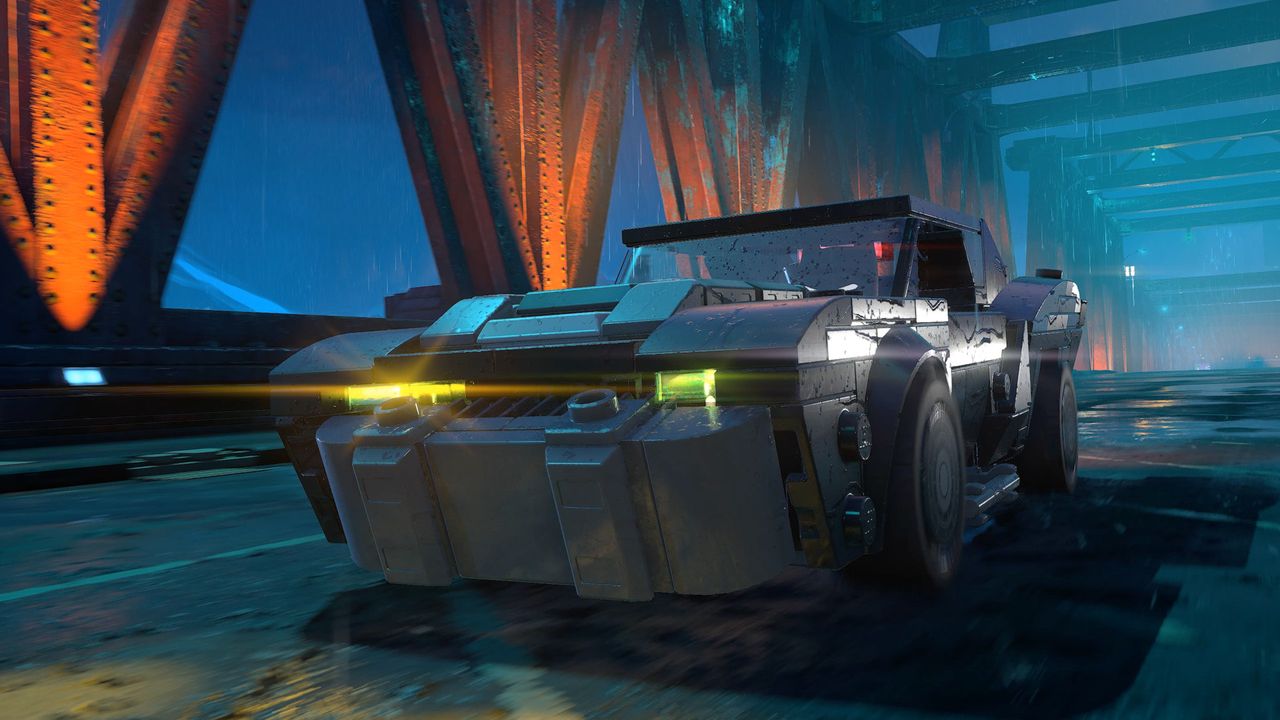 Batman rides the Batmobile across a bridge in Gotham City in Lego Batman: Legacy of the Dark Knight