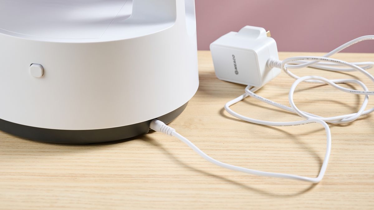 The 1.6m power cable is plugged into the back of the fan's base.