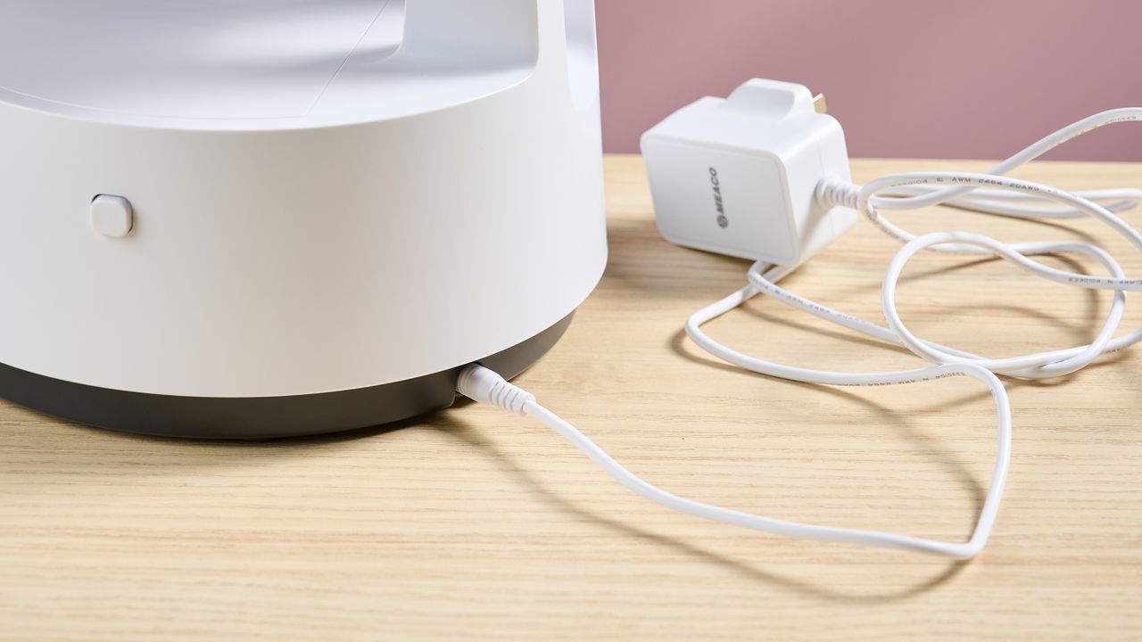 The 1.6m power cable is plugged into the back of the fan's base.