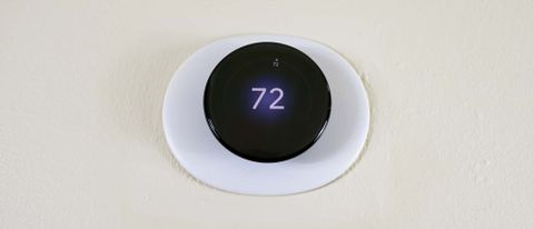 The Nest Learning Thermostat (4th Gen) installed on a wall