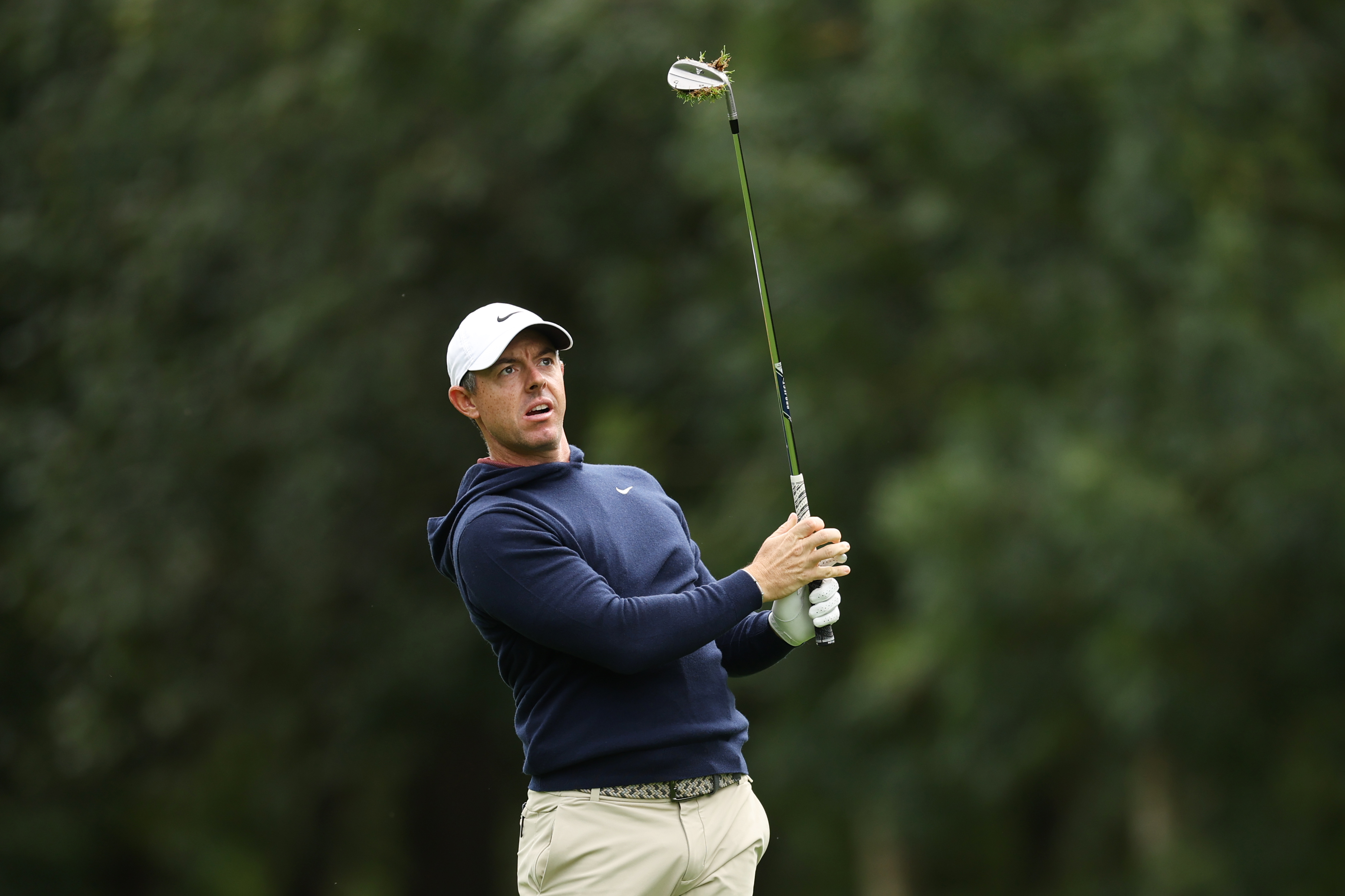 Rory McIlroy hits a wedge shot from the fairway