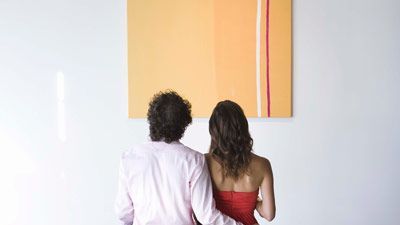 couple looking at art