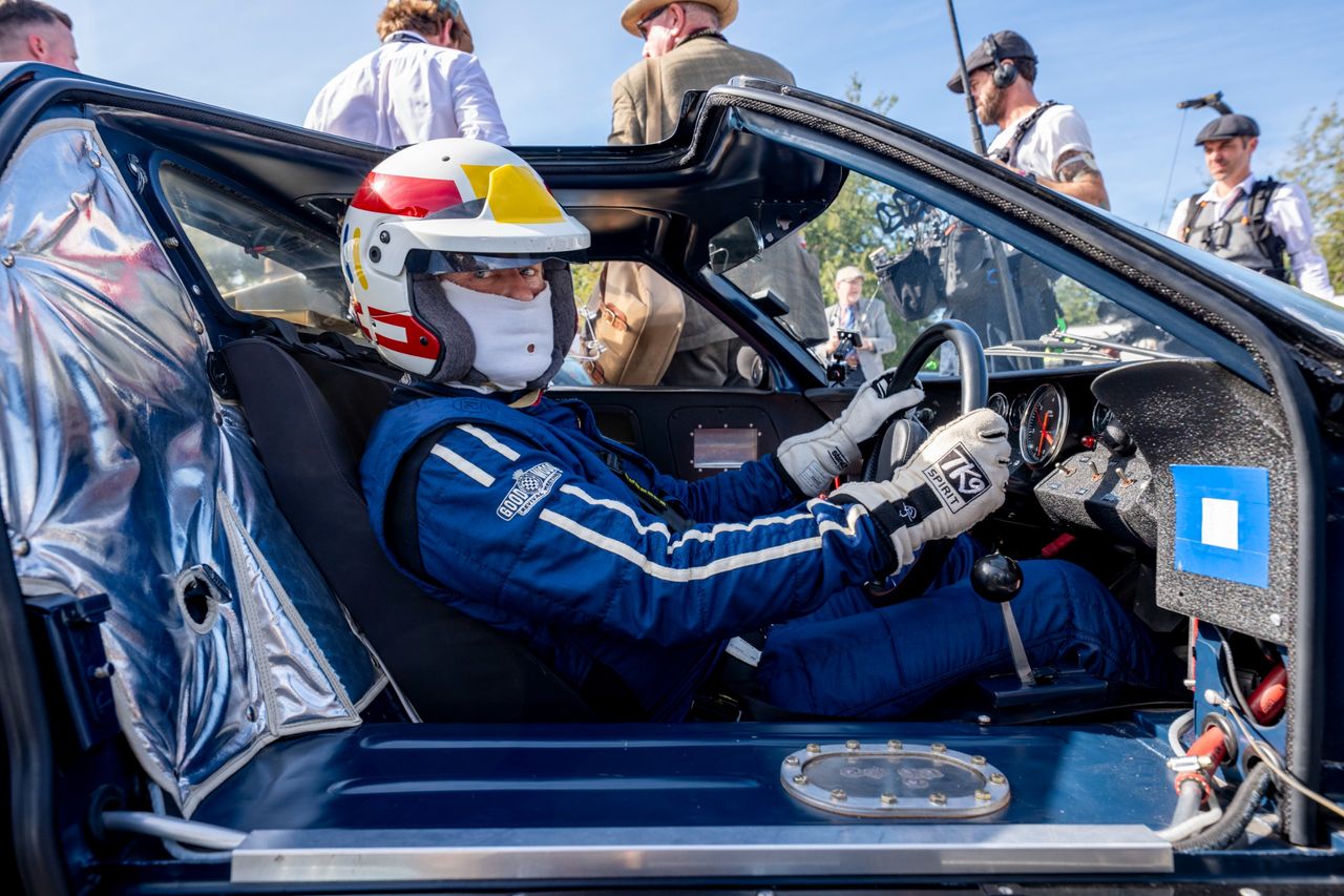 Images from the Revival. Fast cars, people in vintage dress, everyone having a nice time.