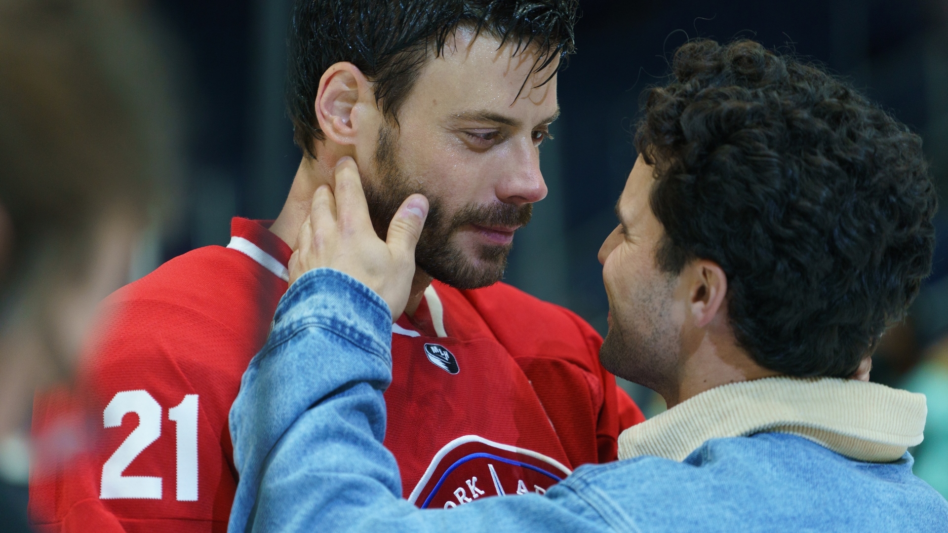 Kip and Scott look at each other intensely in Heated Rivalry