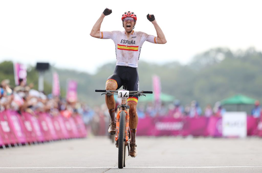 IZU JAPAN JULY 26 David Valero Serrano of Team Spain crosses the finish line celebrating his third place during the Mens Crosscountry race on day three of the Tokyo 2020 Olympic Games at Izu Mountain Bike Course on July 26 2021 in Izu Shizuoka Japan Photo by Michael SteeleGetty Images