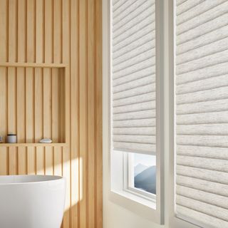 bathroom with wooden background and roller blind window