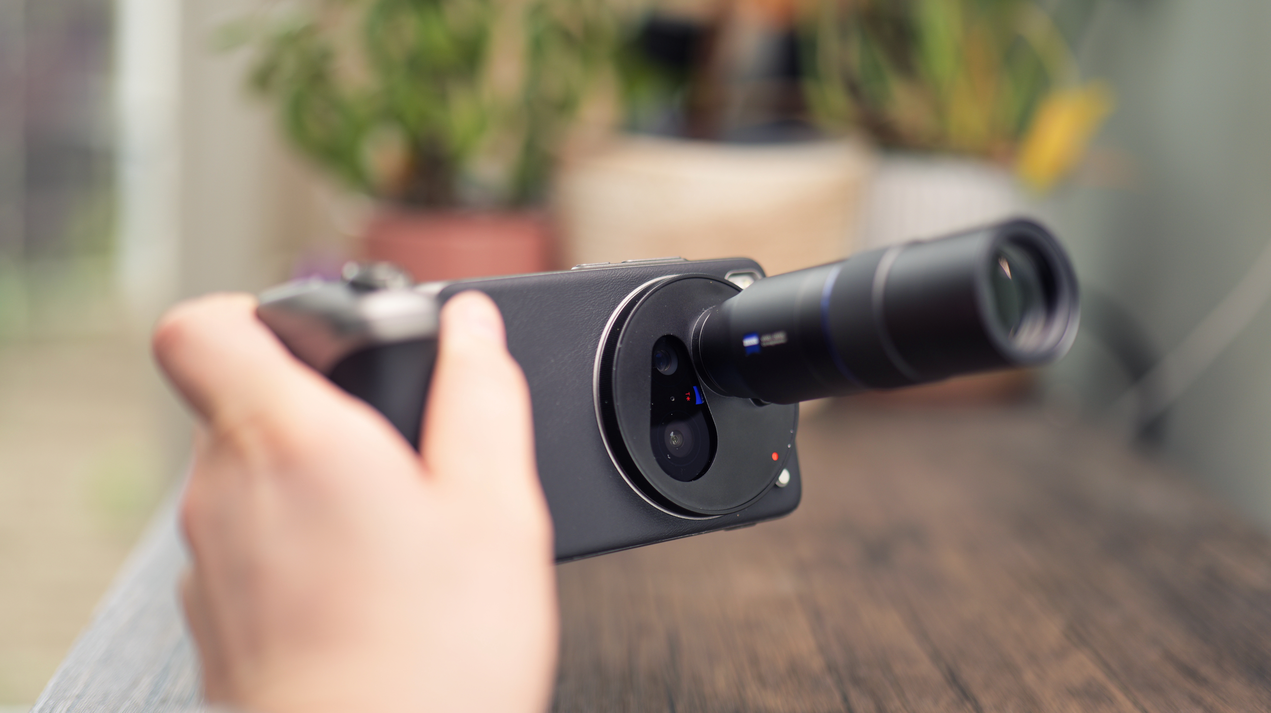 Vivo X200 Ultra phone with telephoto lens attached