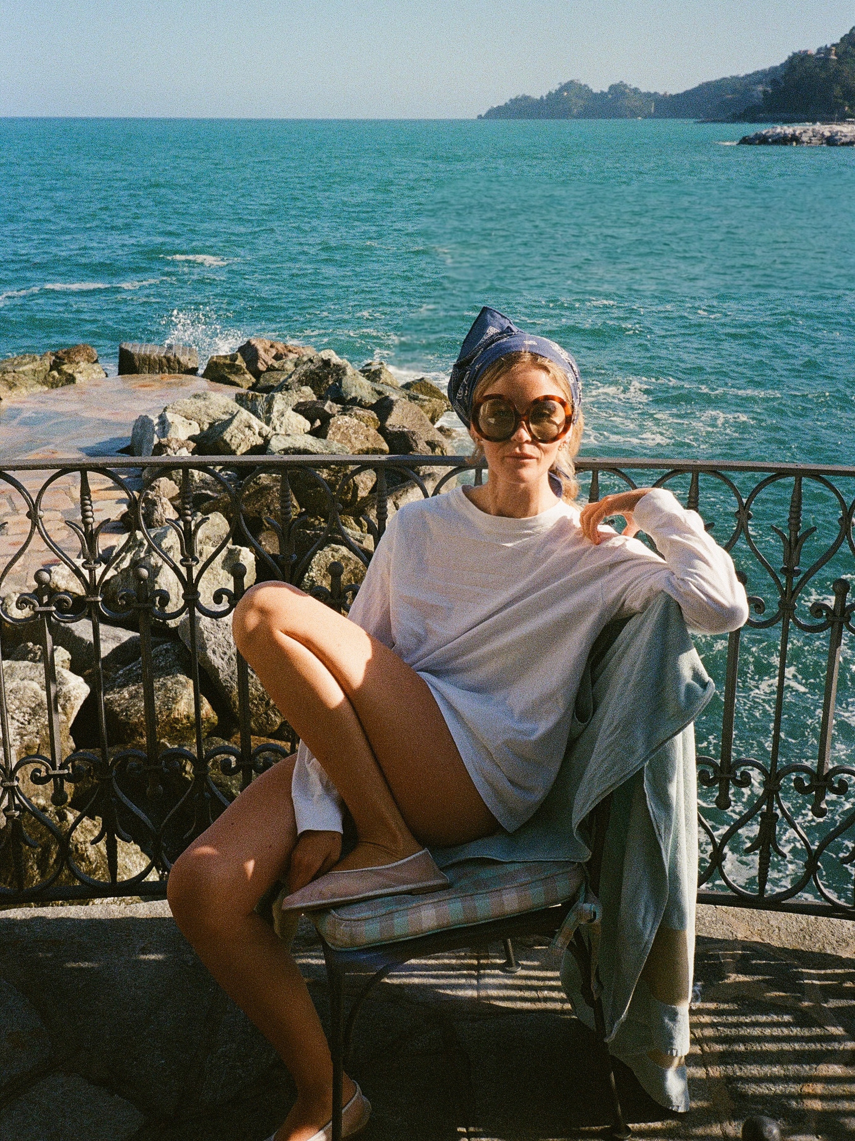 Woman wearing luxury bug-eye sunglasses.