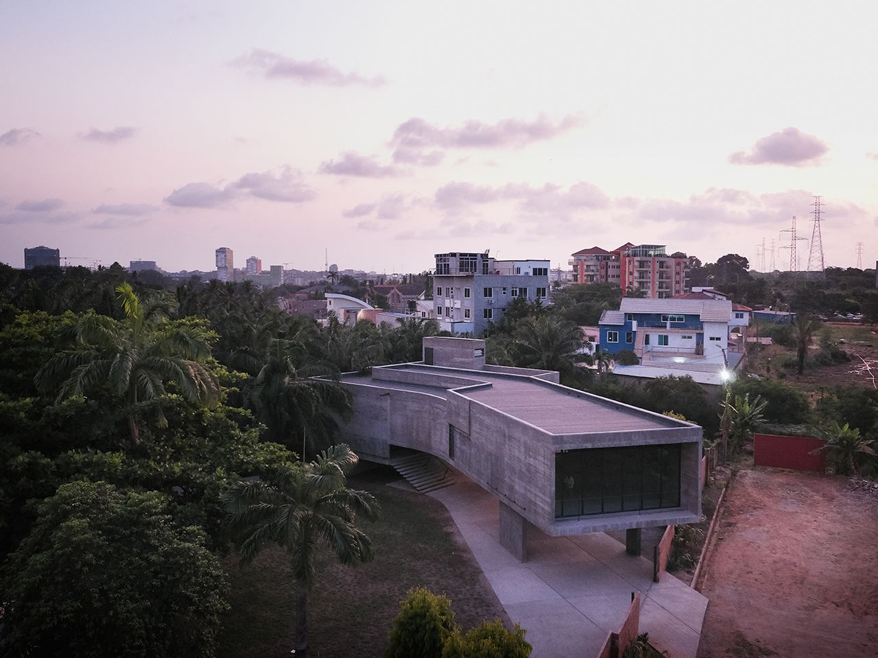 Large concrete structure in amongst trees