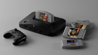 Analogue 3D console in black surrounded by the 8BitDo 64 Bluetooth controller and a variety of N64 cartridges