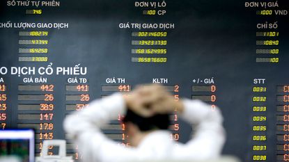 Trader at the Hanoi Securities Trading Centre © Jeff Holt/Bloomberg via Getty Images