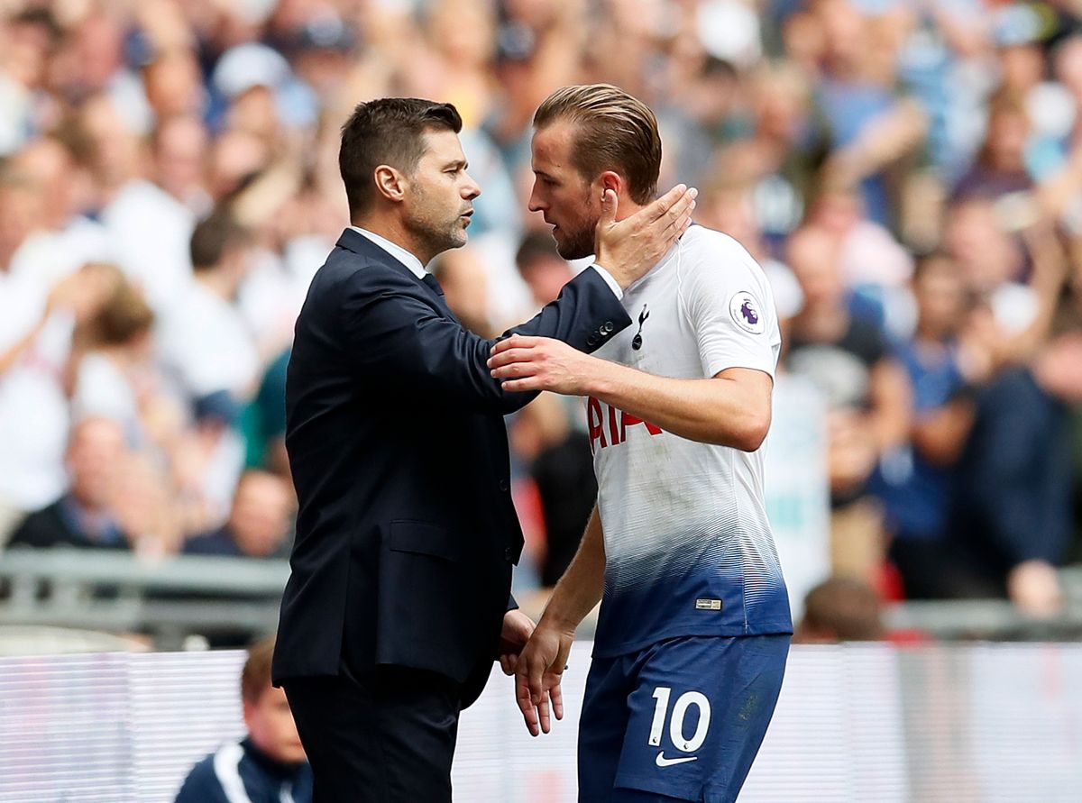 Tottenham&#039;s Harry Kane with Mauricio Pochettino during the Premier League match at Wembley Stadium, London. Picture date 18th August 2018.