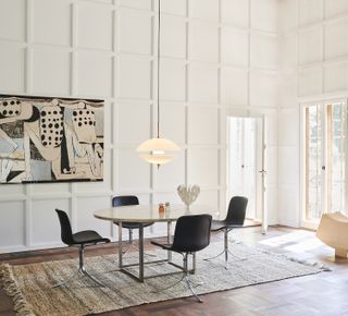 A Danish interior featuring the pendant lamp by Fritz Hansen