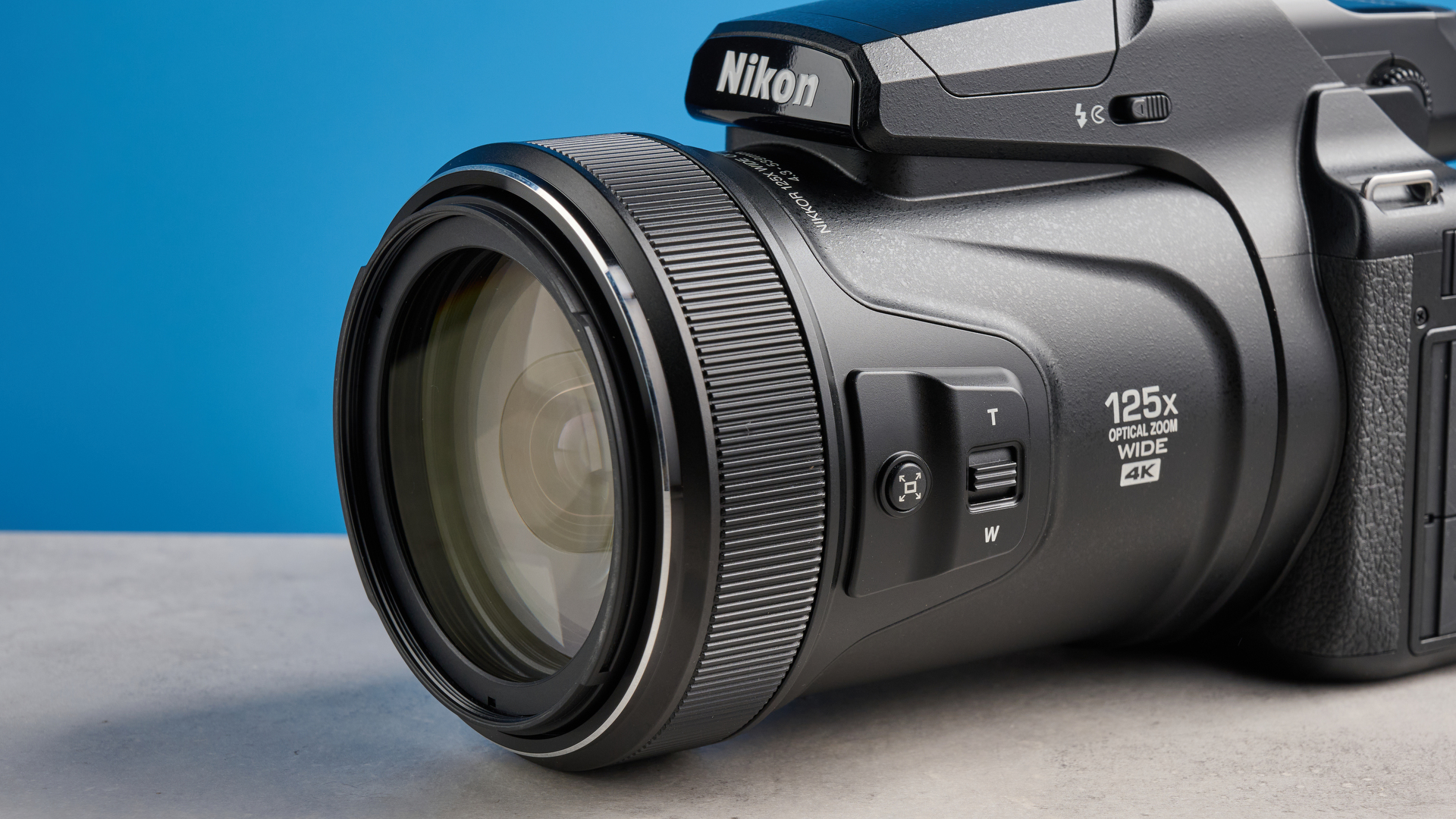 A black Nikon Coolpix P1100 digital camera