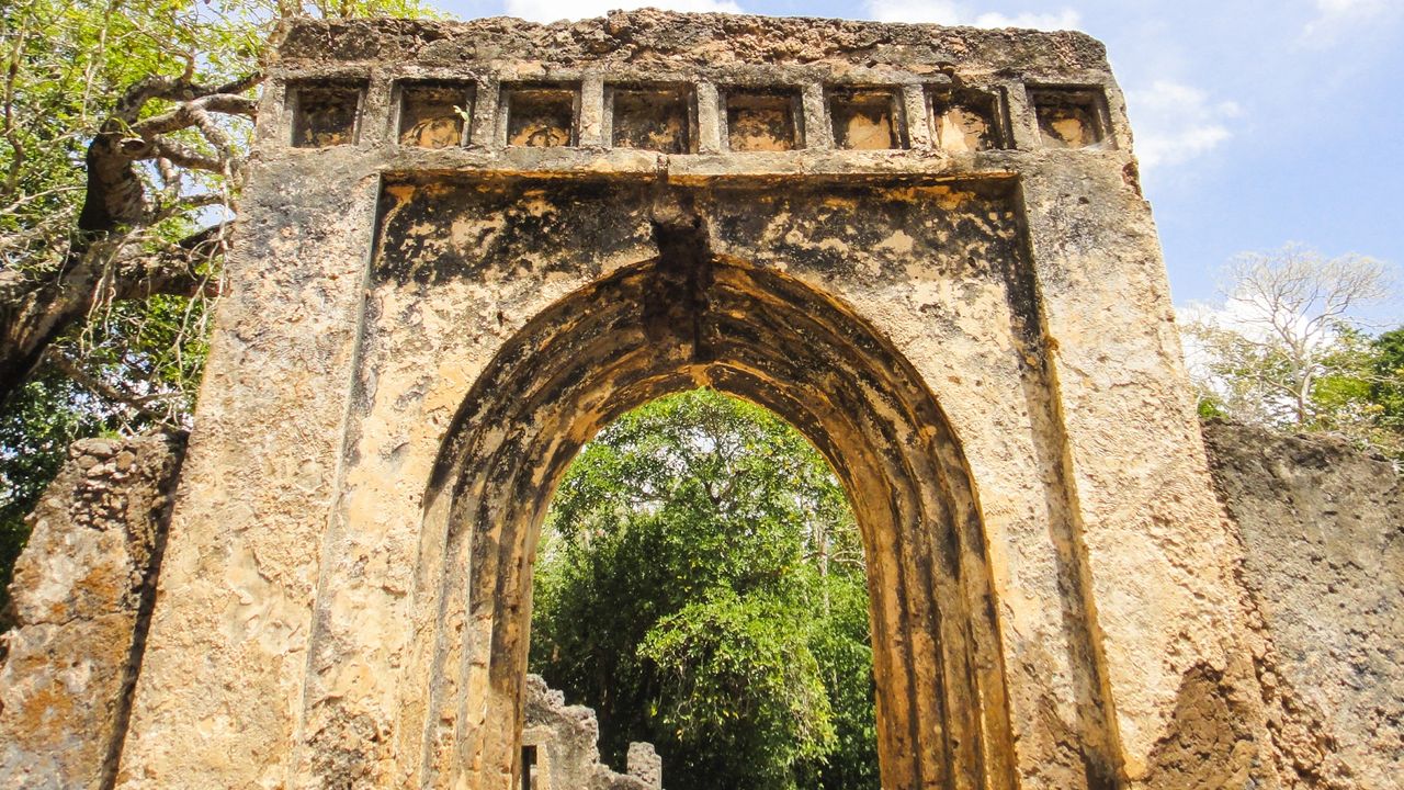 A crumbling gate at the ruins of Gedi, Kenya