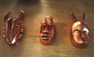 Ceremonial copper masks by Michael Elion at the Artisan shop