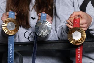 Olympic and Paralympic medals are shown during the unveiling of the Paris 2024 Olympic and Paralympic Games Medals 