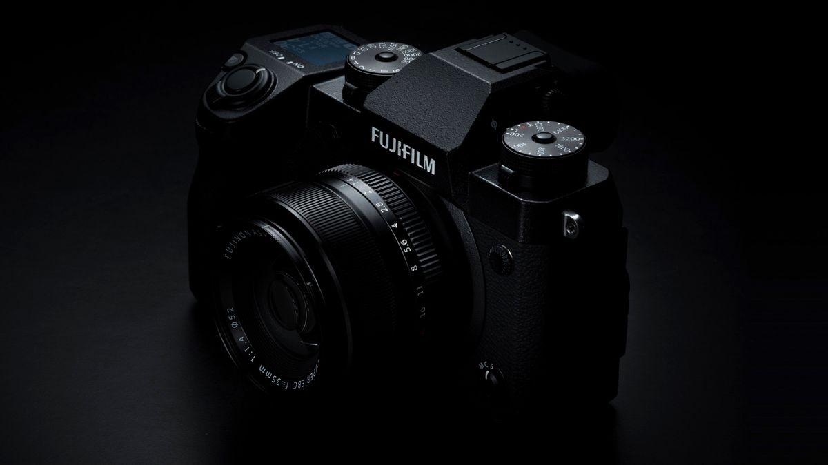 The Fujifilm X-H1 on a dark background