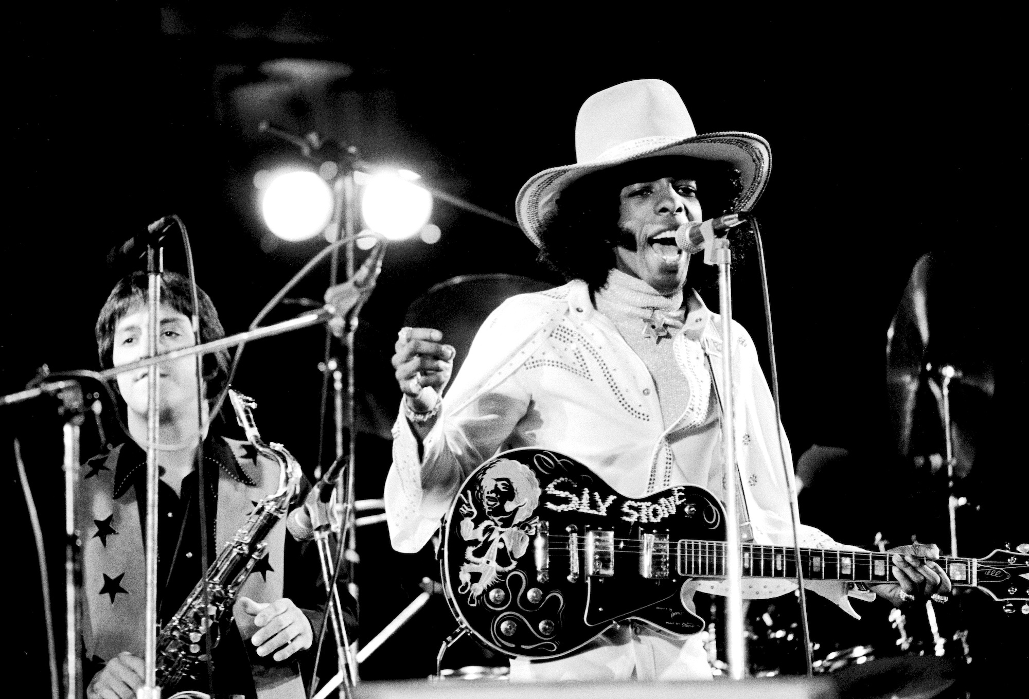 Sly Stone of Sly &amp;amp; the Family Stone performs onstage at White City Stadium in London on July 15, 1973