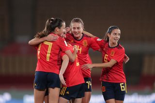 Mariona Caldentey (2ndL) of Spain celebrates scoring their second goal with teammates Amaiur Sarriegi (L), Alexia Putellas (2ndR) and Aitana Bonmati (R) during the FIFA Women's World Cup 2023 Qualifier group B match between Spain and Scotland at La Cartuja stadium on November 30, 2021 in Seville, Spain.