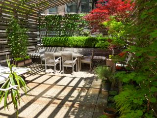 garden terrace ideas with a privacy trellis