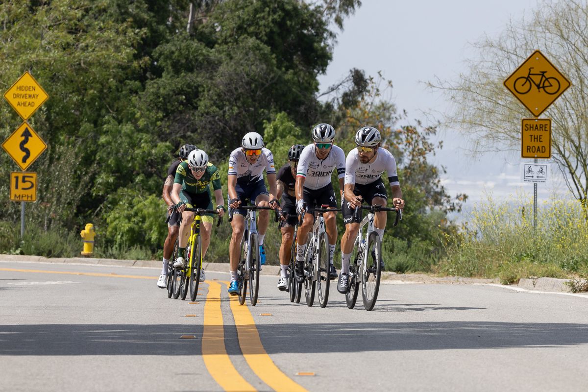 A break of six riders established themselves two laps into the men's race