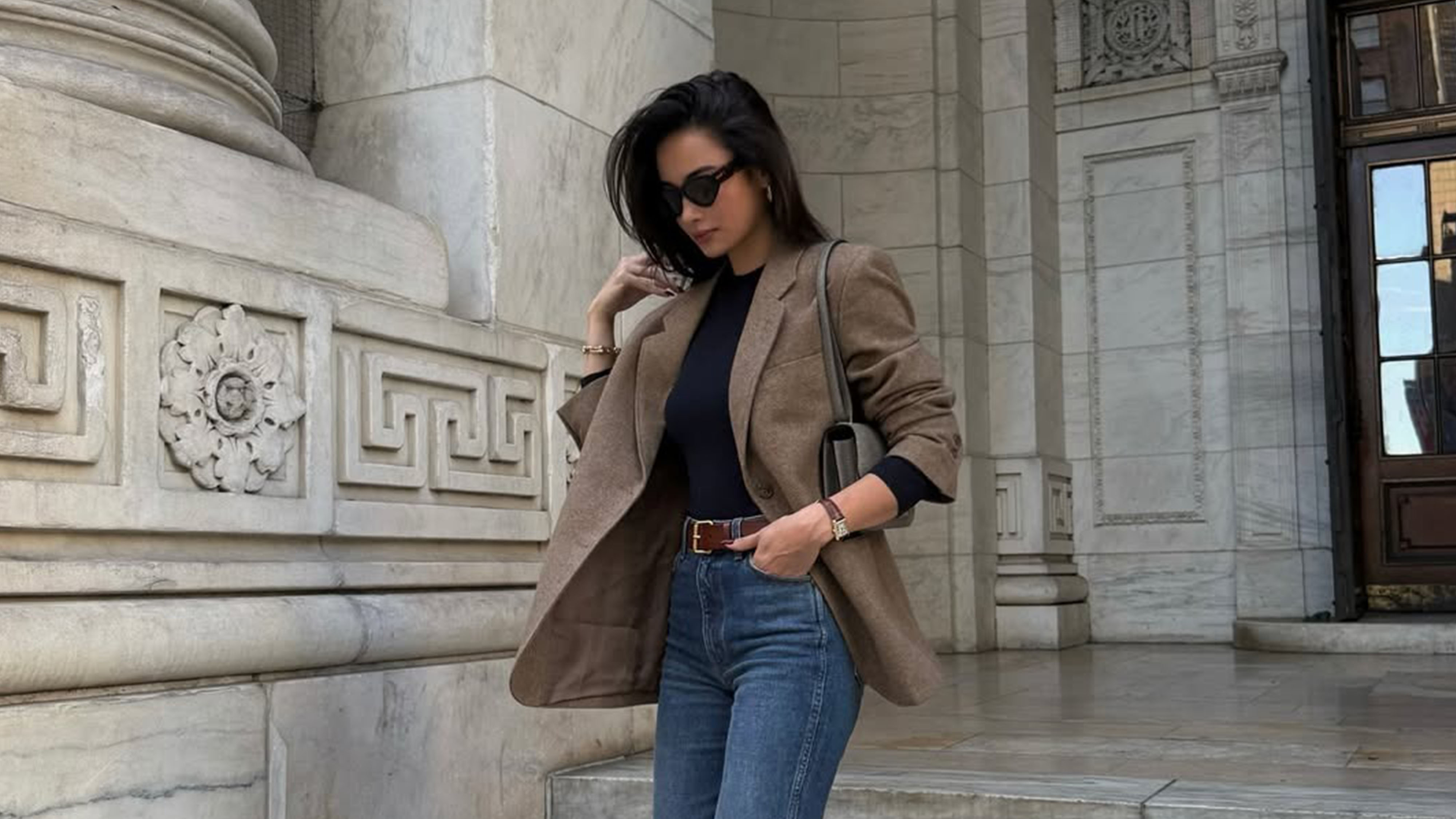 Woman wearing a fall outfit.