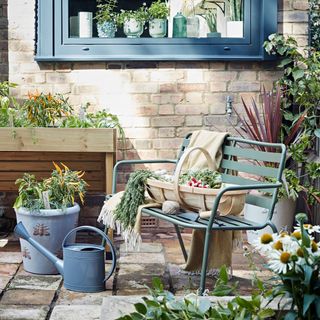 Garden with brick walls and potted plants