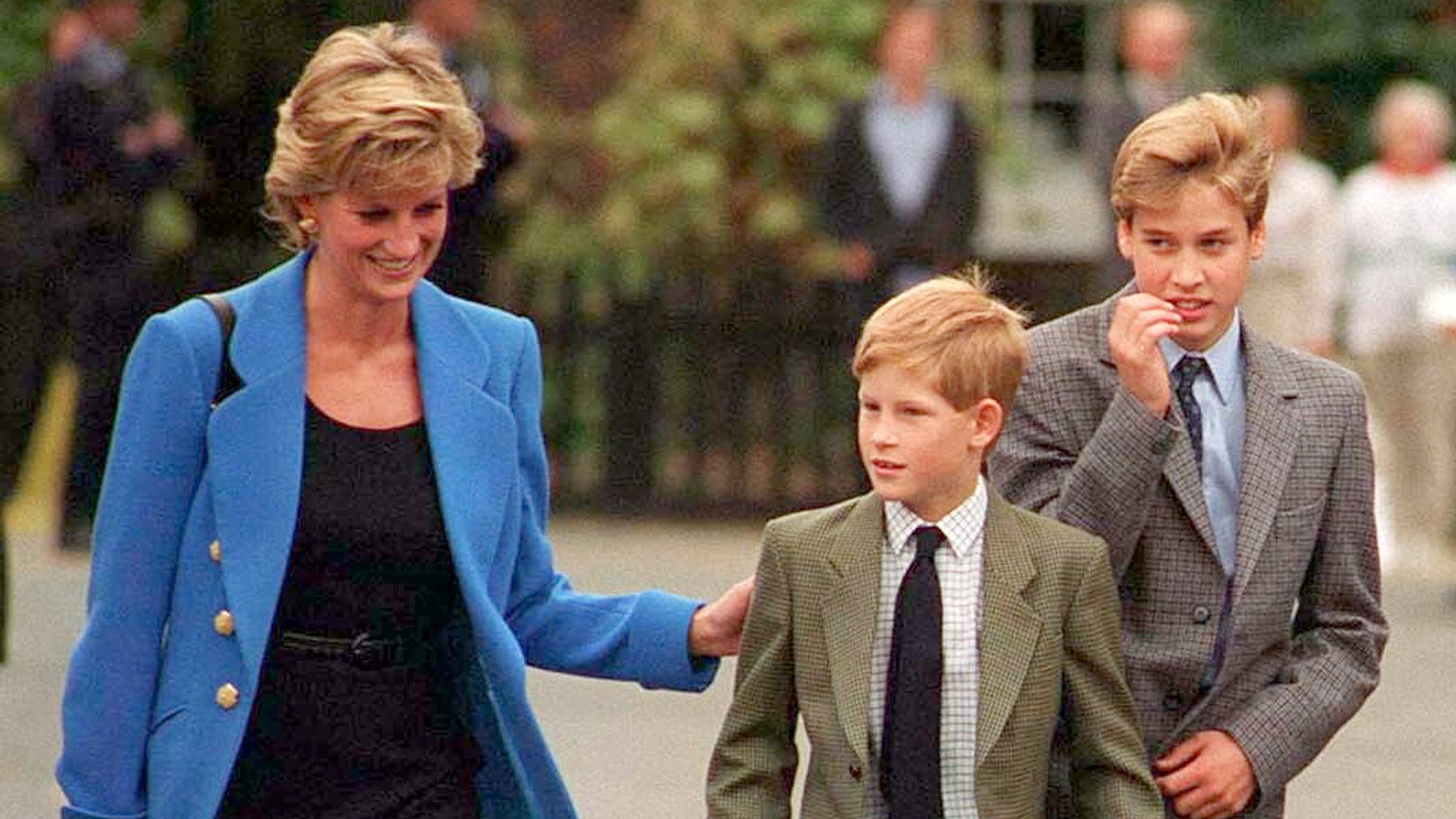 Prince William with Diana, Princess of Wales and Prince Harry on the day he joined Eton in September 1995