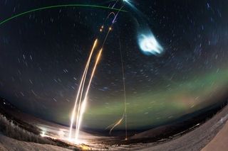 A timelapse image shows three suborbital rockets launching the Super Soaker mission.